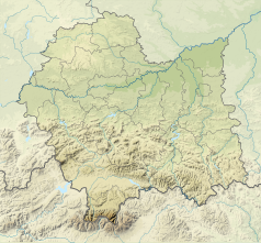 Mapa konturowa województwa małopolskiego, blisko dolnej krawiędzi nieco na lewo znajduje się punkt z opisem „źródło”, natomiast na dole nieco na lewo znajduje się punkt z opisem „ujście”