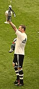 Kevin Nolan with Championship trophy.jpg