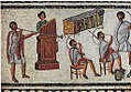 Image 70Musicians playing a Roman tuba, a water organ (hydraulis), and a pair of cornua, detail from the Zliten mosaic, 2nd century AD (from Culture of ancient Rome)