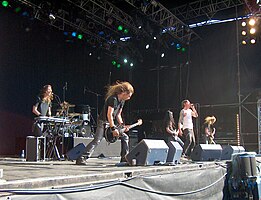 Audrey Horne live at Quart Festival in 2005. From left to right: Herbrand Larsen, Kjetil Greve, Arve Isdal, Tom Cato Visnes, Torkjell Rød and Thomas Tofthagen.