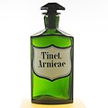 Pharmacy bottle in green, Art Nuevo ab. 1900; the glas is labeled Tinct. Arnicae = Arnicae tinctura (Arnikatinktur). Size: 20 cm high.