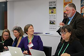 Editors discussing Wikipedia updates at Edit for Equity event in Wellington, New Zealand.