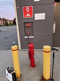 2 bollards protecting a fire hydrant at the Centre commercial Saint-Martin