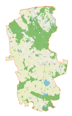 Mapa konturowa gminy Srokowo, blisko centrum na prawo znajduje się punkt z opisem „Srokowo”