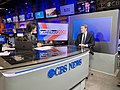 Image 40Presenter Reena Ninan interviewing politician Michael Bennet on CBS News (from News presenter)