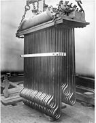 Superheater of a Lancashire boiler 1900, for the extraction of heat from waste gasses, and transfer of heat to saturated steam passing from the boiler to the steam range or engine. This raised the overall thermal efficiency of the plant, and would also prevent damage from slugs of condensate by ensuring the saturated steam was dry and not wet.[118]