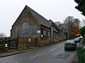 The large gate at foreground left was until the 1980s the site of the level crossing at Brymbo West, where the line crossed Brymbo High Street.