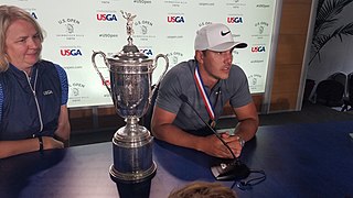 Brooks Koepka with the U.S. Open Trophy.jpg