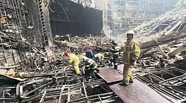 Zwaar beschadigde amfitheater in Crocus City Hall, de dag na de aanslag.