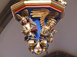 Console du pendentif: Anges musiciens avec orgue et mandoline