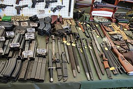 Victory Show Cosby UK 06-09-2015 WW2 re-enactment display Trade stalls Misc. militaria personal gear replicas reprod. originals collect. zaphad1 Flickr CCBY2.0 Ammo mags grease carabine AK47 UZI VIG Browning MG13 bayonets etc IMG 3831.jpg