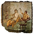 Image 71A late Republican banquet scene in a fresco from Herculaneum, Italy, c. 50 BC; the woman wears a transparent silk gown while the man to the left raises a rhyton drinking vessel (from Culture of ancient Rome)