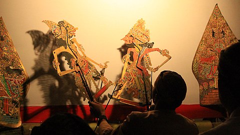 A wayang show in Java, Indonesia, presenting a wayang puppet.