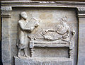 Image 41Slave holding writing tablets for his master (relief from a 4th-century sarcophagus) (from Roman Empire)