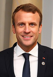 A smiling Emmanuel Macron