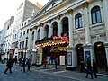 Image 36Music hall evolved into variety shows. First performed in 1912, the Royal Variety Performance was first held at the London Palladium (pictured) in 1941. Performed in front of members of the Royal Family, it is held annually in December and broadcast on television. (from Culture of the United Kingdom)