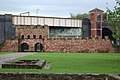 Image 2A reconstructed gateway of Mamucium fort (from History of Manchester)