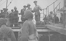 Indian soldiers near boat boarding ramp, Tientsin, China, 1907 (CHANDLESS 260).jpeg