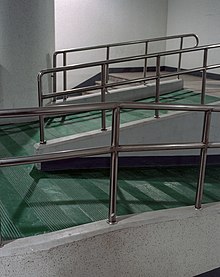 An entrance with ramps and guardrails