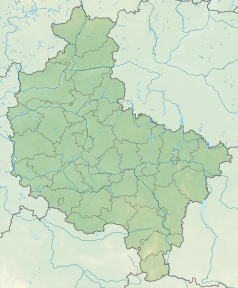 Mapa konturowa województwa wielkopolskiego, blisko centrum na lewo znajduje się punkt z opisem „Krajkowo”