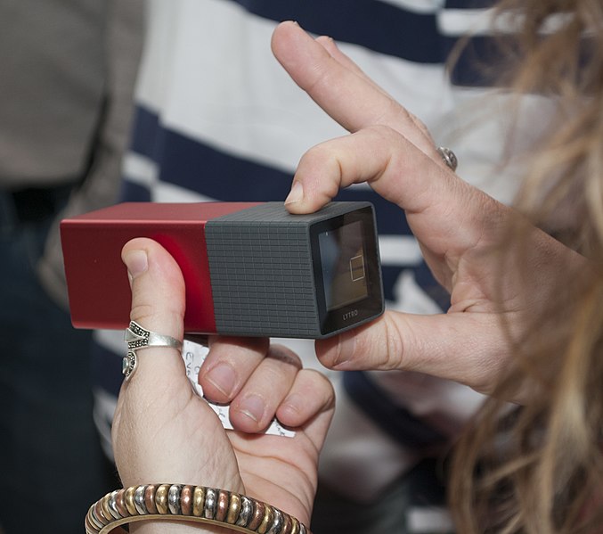 File:Attendee taking photo with Lytro light field camera (back).jpg