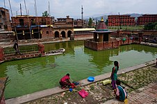 Washing in Khya:h Pukhu, Bhaktapur