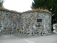 Remains of the town wall corner bastion.