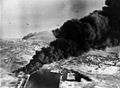 Image 79Smoke rises from oil tanks beside the Suez Canal hit during the initial Anglo-French assault on Egypt, 5 November 1956. (from Egypt)