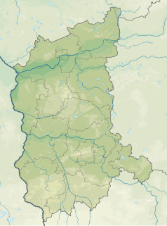 Mapa konturowa województwa lubuskiego, po lewej nieco na dole znajduje się owalna plamka nieco zaostrzona i wystająca na lewo w swoim dolnym rogu z opisem „Jańsko”