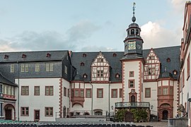 The same east wing from inside the Renaissance courtyard, with clocktower