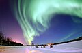 Eielson Air Force Base, Alaska — The Aurora Borealis, or Northern Lights, shines above Bear Lake