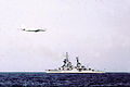 A Tu-95 Bear overflies a Sverdlov-class cruiser 1975