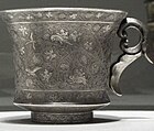 Central Asian influence can be seen in the shape of this cup.