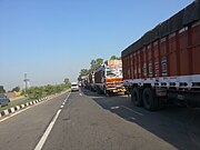 Trucks on the former Indian National Highway 1, waiting to cross the border at Wagah–Attari.