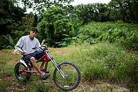 Young man on his bike with machete in Mayagüez, Puerto Rico.jpg