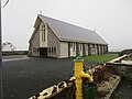 Our Lady Of Lourdes Church in Cross with the Village Pump