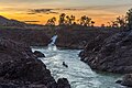 113 Li Phi falls at sunset with orange sky and a fishing boat in Don Khon Si Phan Don Laos uploaded by Basile Morin, nominated by Basile Morin,  20,  1,  1