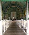 Intérieur de l'église Sainte-Cécile, construite en 1813, mais dont la décoration plus récente lui a valu le surnom d'« église bonbon ».