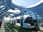 A tram in Wuhan University Science Park (Wudayuan) Station, one of the few elevated stations of the system