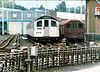 Two London Underground trains at Hainault Depot circa 1984