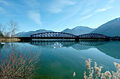 Railroad bridge across the river Drau near the castle Hollenburg and close to the village Strau