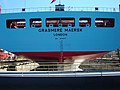 Containerschiff Heckansicht, Tiefgangsmarke (Ahming), IMO-Nr. (Schiffsnummer) Mooringdeck mit Winden und Tauklüsen