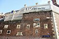 Tradesmans plaques on the wall of Amsterdam Museum,