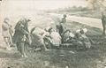 Armenian refugees in Hauran, Syria eating a carcass of a horse.