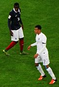 France midfielder Blaise Matuidi and England midfielder Dele Alli (23125466531).jpg