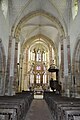 Gothique rayonnant du chœur qui présente une élévation à trois étages au-dessus d'un soubassement à arcatures aveugles : fenêtres basses, triforium à claire-voie et fenêtres hautes, église Saint-Amand.