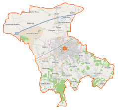 Mapa konturowa gminy Grodzisk Mazowiecki, w centrum znajduje się punkt z opisem „Warszawska Kolej Dojazdowa”