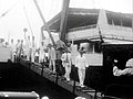 Seiei Matsui & Employees of Osaka Boeki Kaisha (Osaka Bazar) disembark in either Manila or Davao in the Philippines (May 1934). Matsui, the general manager, is second from front.