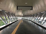 Pedestrian link over Persiaran Bandar Utama heading towards Entrance A of the station from 1Powerhouse.