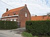 Hoeve met losstaande bestanddelen uit het interbellum